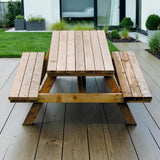 Naturbelassener Holz Picknicktisch Wenholthausen auf einer Terrasse vor modernem Haus