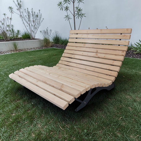 gartenhulz.com natural Douglas fir wood lounger with curved design and fixed base, perfect for outdoor relaxation.