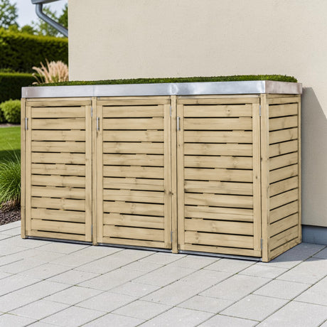 Mülltonnenbox Röhr aus Holz für drei Tonnen vor einer Hauswand auf Pflaster
